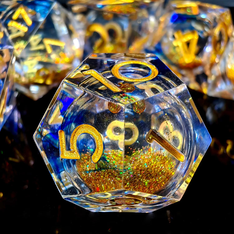 7-Piece Sharp Edge Resin Dice Set – Transparent Polyhedral Dice with Golden Sand & Gold Lettering for D&D & RPG Games Gamers Guild