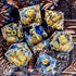 7-Piece Sharp Edge Resin Dice Set – Transparent Polyhedral Dice with Golden Sand & Gold Lettering for D&D & RPG Games Gamers Guild