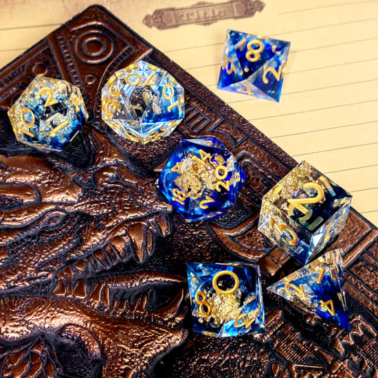 7-Piece Light Blue Resin Polyhedral Dice Set – Gold Numbered DND Dice for RPG & Tabletop Games Gamers Guild