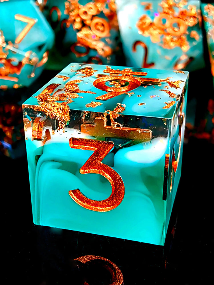 7-Piece Sharp Edge Resin Dice Set – Green Transparent Base with Copper Numbers for D&D & Tabletop RPGs Gamers Guild