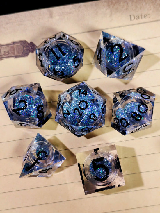 7-Piece Sharp Edge Resin Dice Set – Transparent Polyhedral Dice with Silver Sand & Black Numbers for D&D & RPG Tabletop Games Gamers Guild