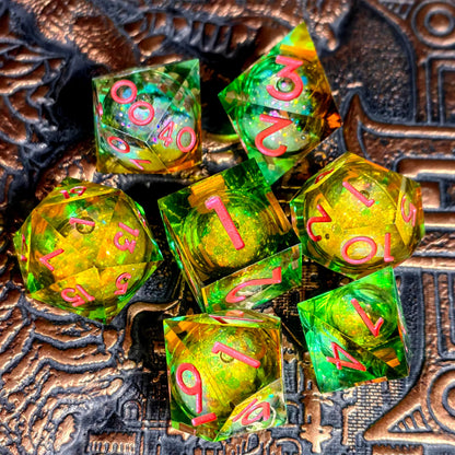 7-Piece Sharp Edge Resin Dice Set – Transparent Polyhedral Dice with Golden Sand & Gold Lettering for D&D & RPG Games Gamers Guild