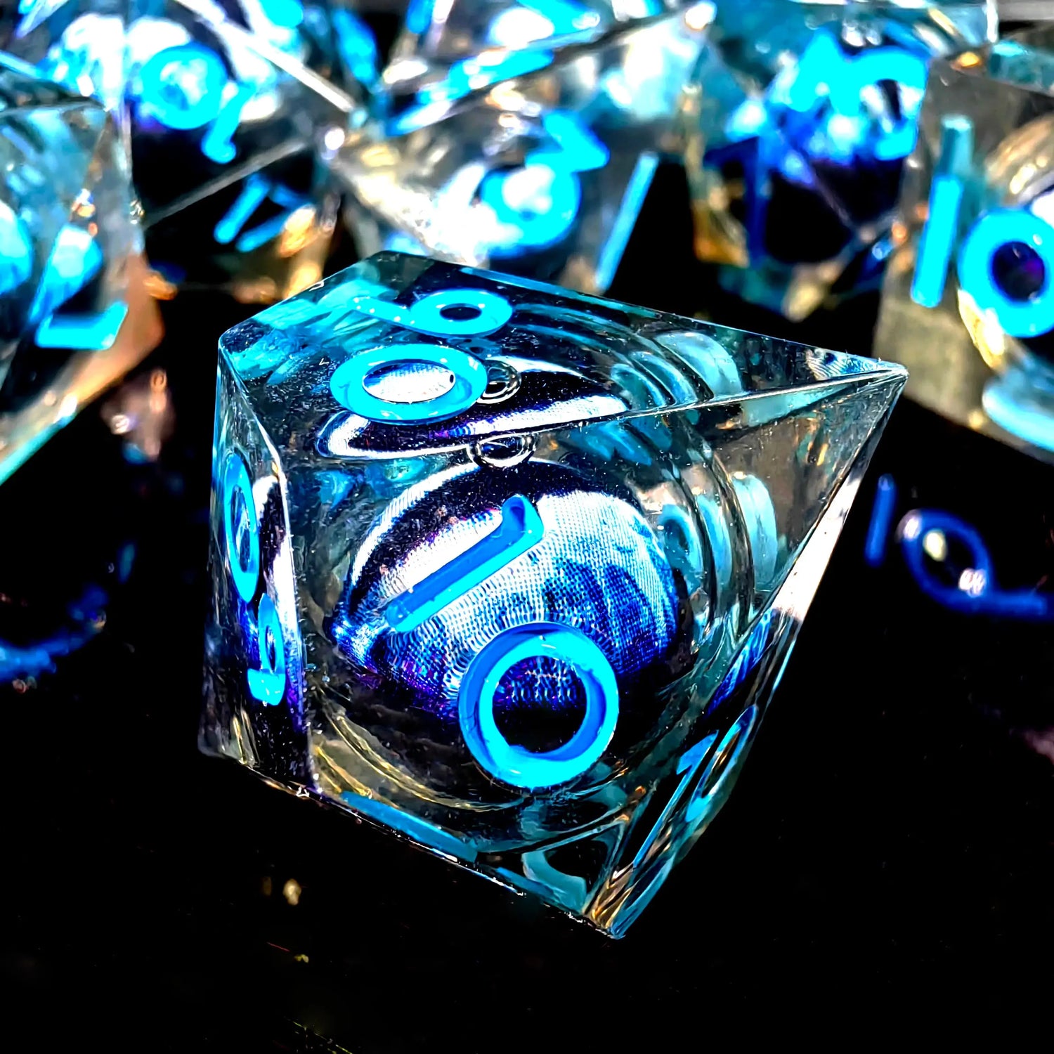 Spinning Dragon Eye Resin Dice Set – 7-Piece Transparent Polyhedral Dice with Blue Text for RPGs Gamers Guild