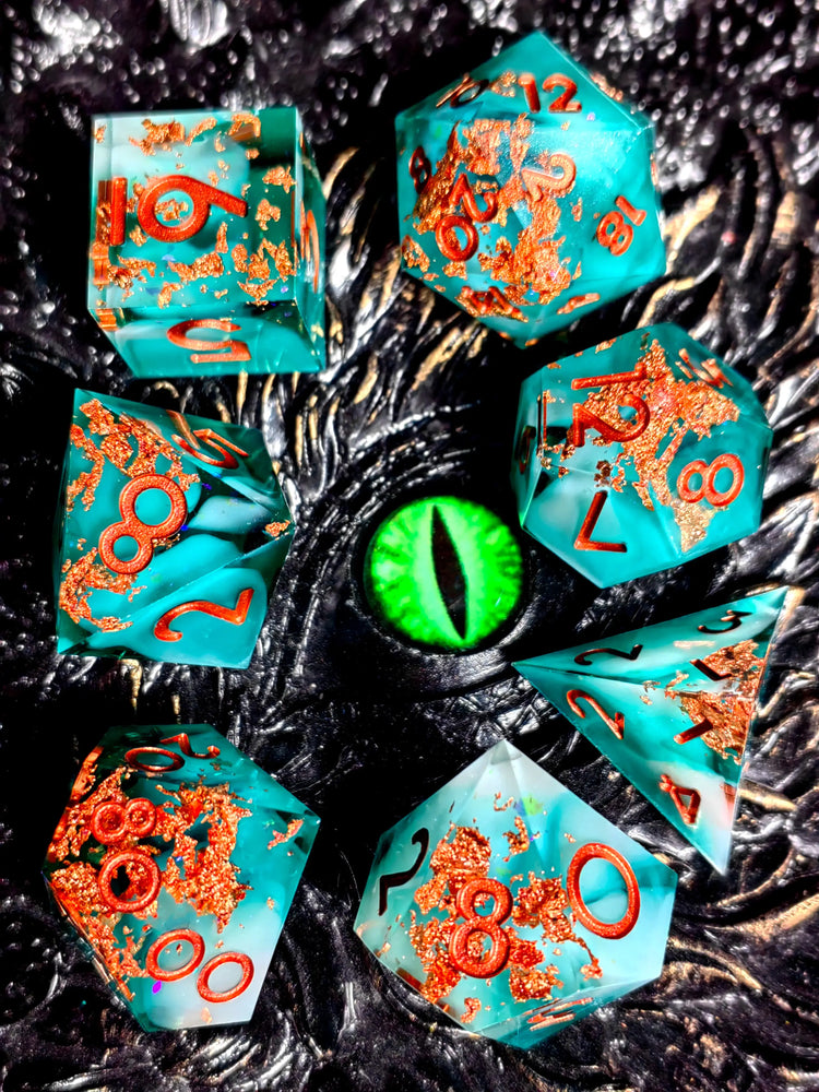 7-Piece Sharp Edge Resin Dice Set – Green Transparent Base with Copper Numbers for D&D & Tabletop RPGs Gamers Guild