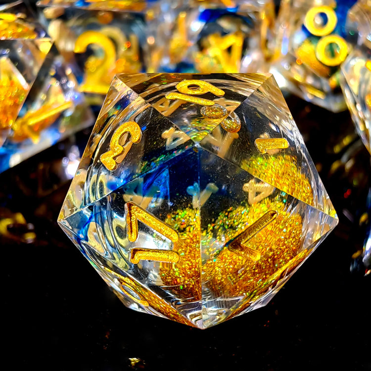 7-Piece Sharp Edge Resin Dice Set – Transparent Polyhedral Dice with Golden Sand & Gold Lettering for D&D & RPG Games Gamers Guild