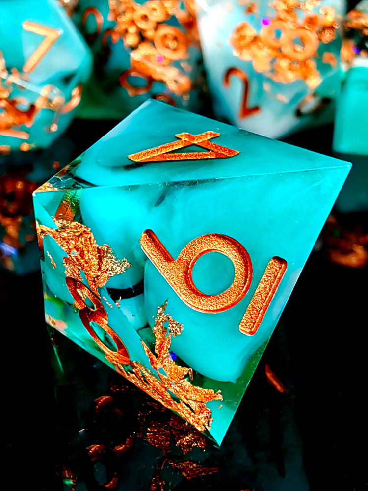 7-Piece Sharp Edge Resin Dice Set – Green Transparent Base with Copper Numbers for D&D & Tabletop RPGs Gamers Guild