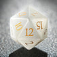 White Jade Pirate D12 die with golden numerals, showcasing intricate craftsmanship and shimmering design.