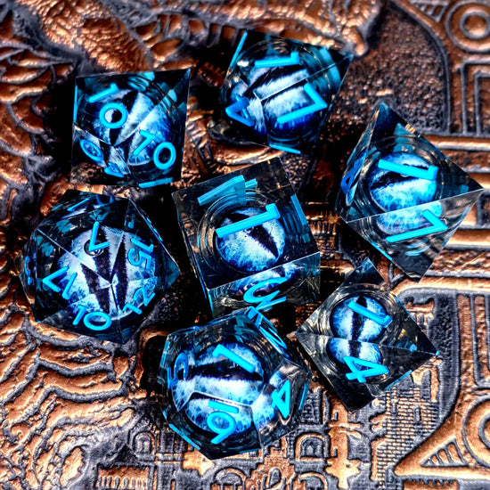 Spinning Dragon Eye Resin Dice Set – 7-Piece Transparent Polyhedral Dice with Blue Text for RPGs Gamers Guild