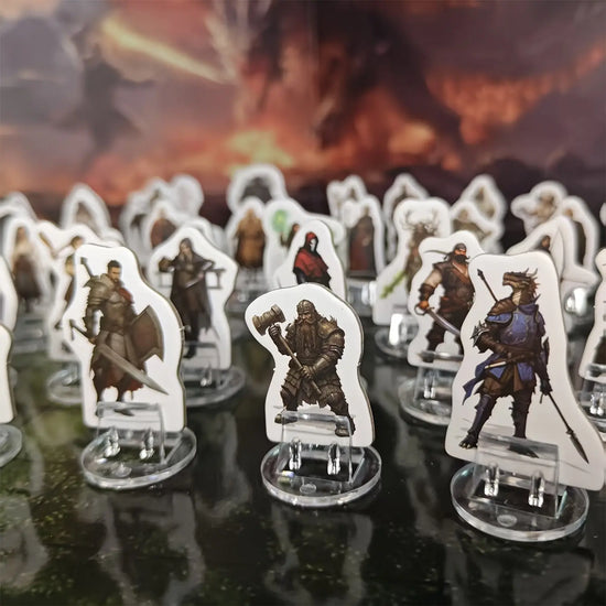 Colorful 2D DND miniatures set featuring heroes and monsters on clear stands for tabletop RPG adventures.